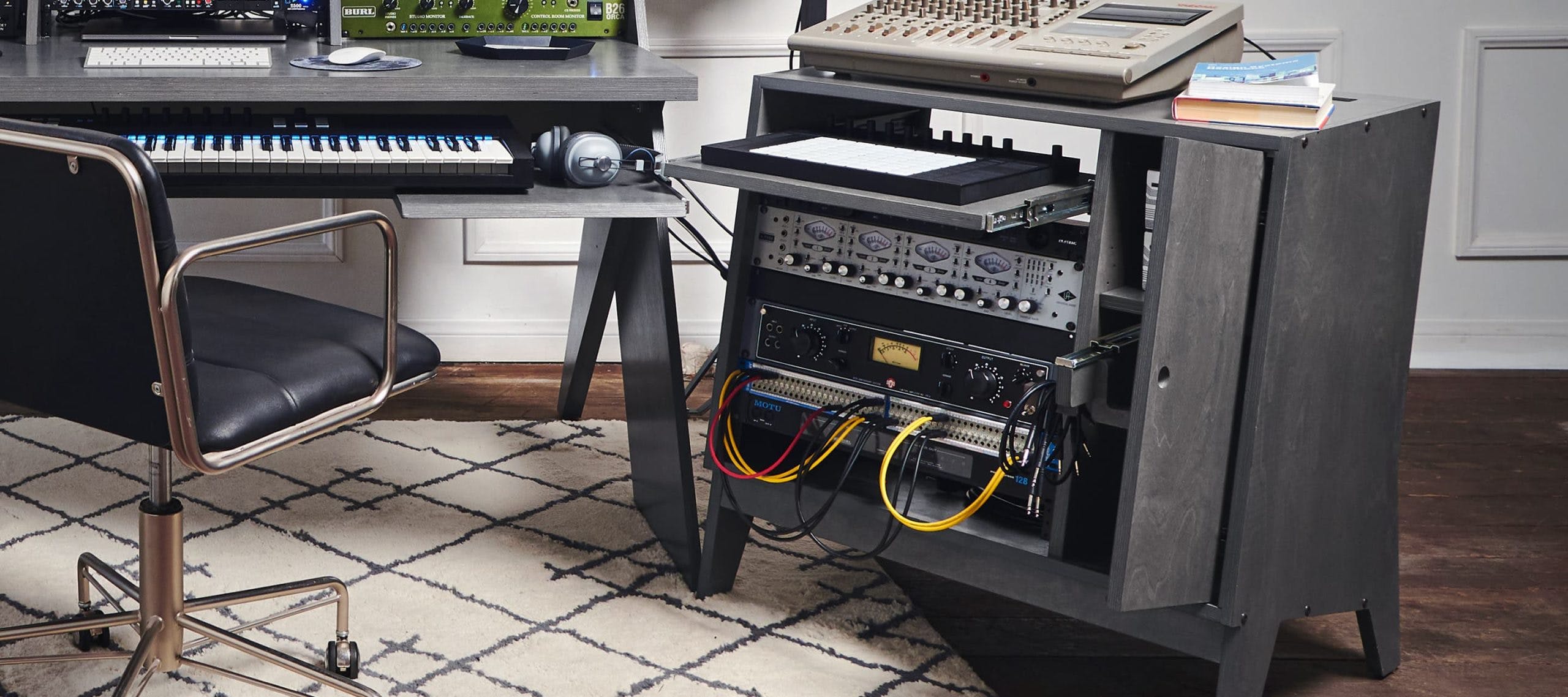 Grey Output Sidecar accessory holding preamps and MIDI controller.
