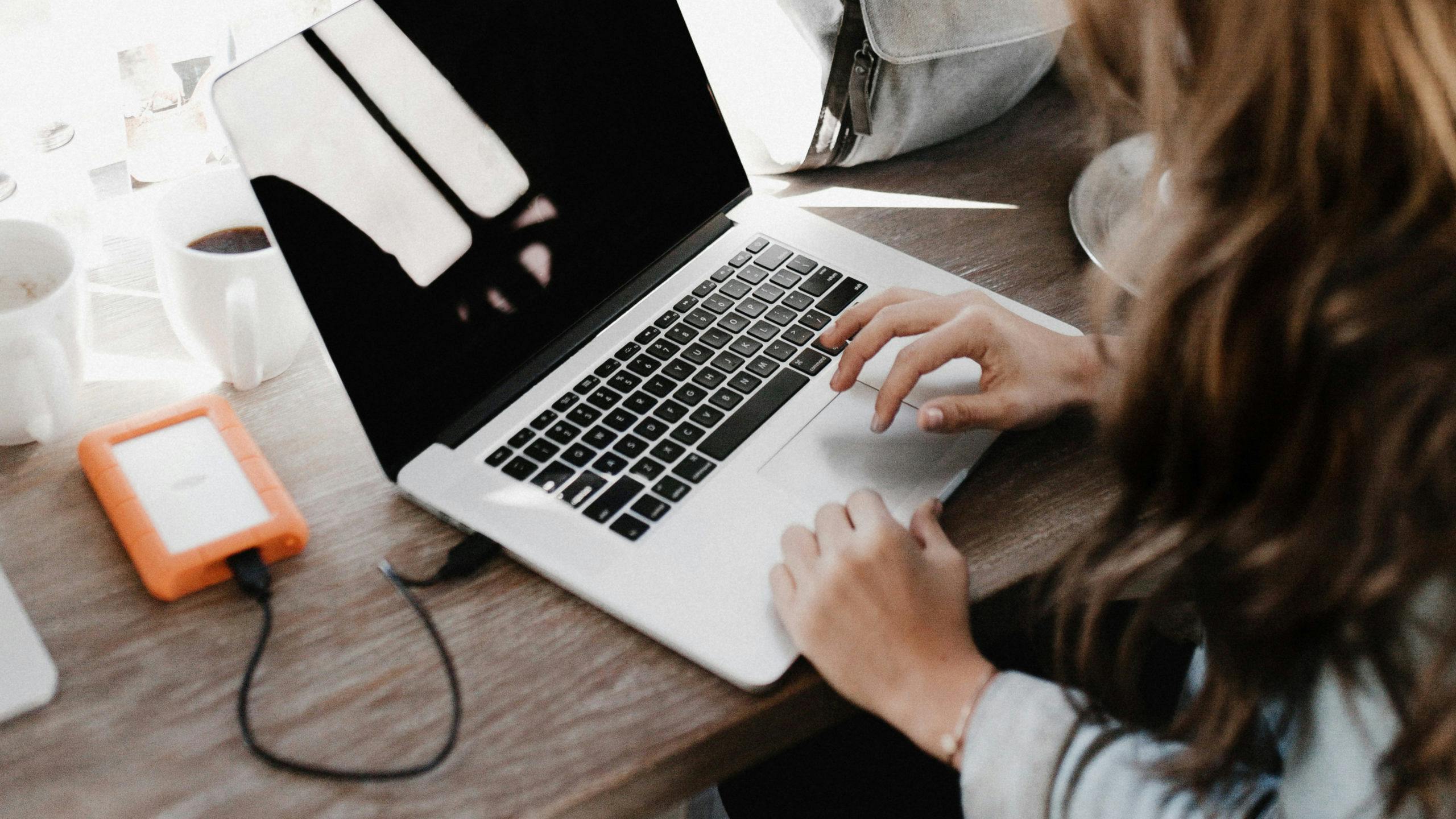 Portable external hard drives attached to laptop for making music